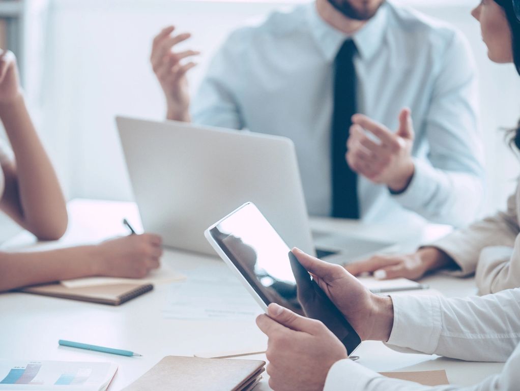 Professional team collaborating in a modern office setting