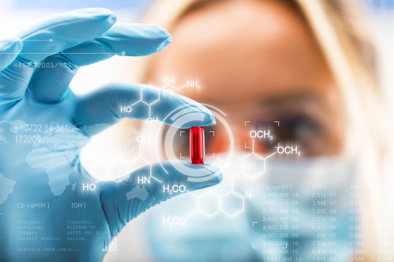 Pharmaceutical research scientist working in a modern laboratory
